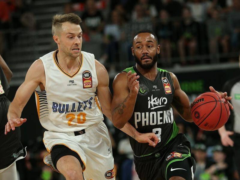 John Roberson (R) has bagged 30 points in South East Melbourne's 20-point NBL win over Brisbane.