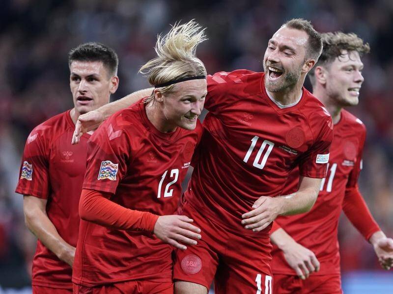 Denmark's Kasper Dolberg (second left) celebrates his goal in the 2-0 win over France. (AP PHOTO)