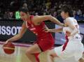 Canada's Kia Nurse on the attack against Japan at the women's Basketball World Cup in Sydney. (AP PHOTO)