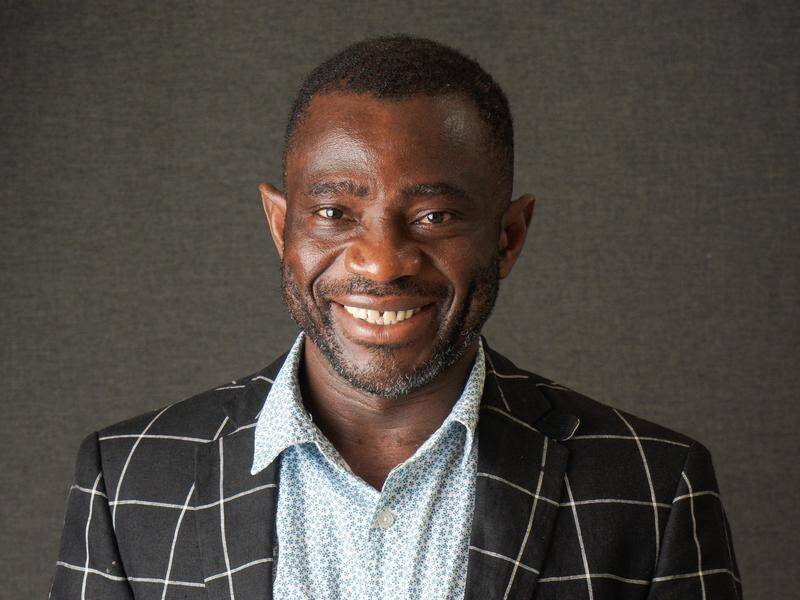 John Kamara started a new life in Tasmania after arriving from Sierra Leone as a refugee. (SUPPLIED)