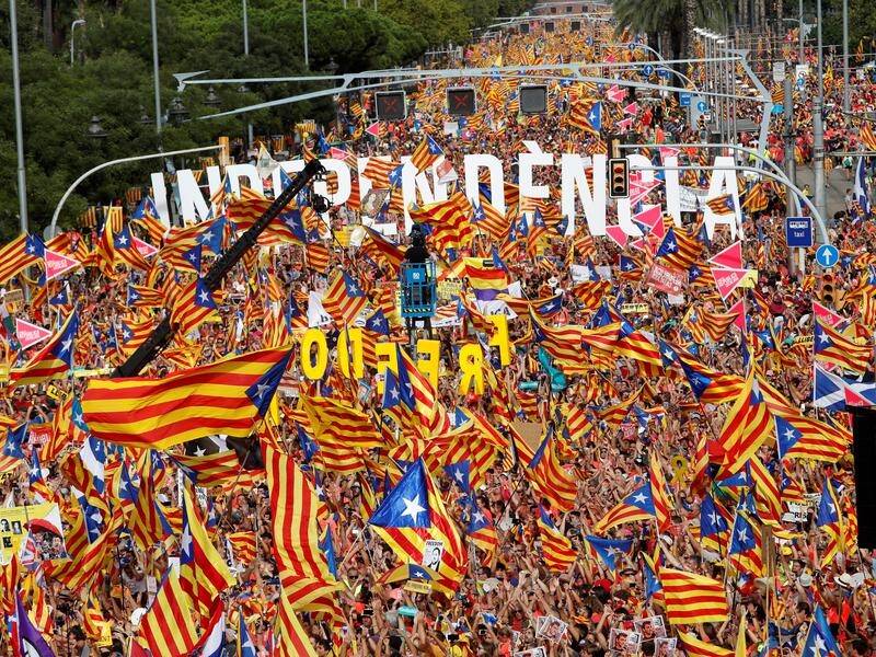 One million people have taken to the streets of Barcelona to mark the city's fall to Spain in 1714.