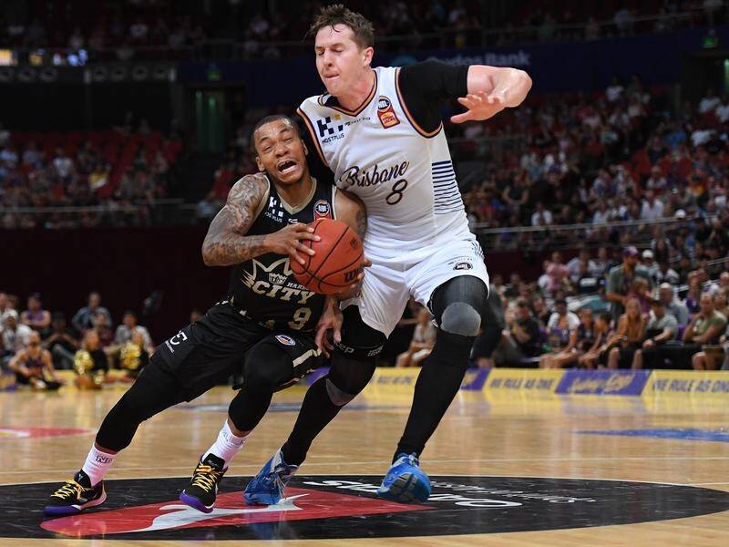 Jerome Randle (L) has bagged 26 points in Sydney's 107-91 NBL defeat of Brisbane.
