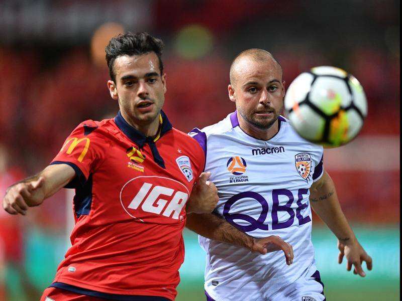 Nikola Mileusnic, left, scored the winner as Adelaide saw off Perth Glory at Coopers Stadium.