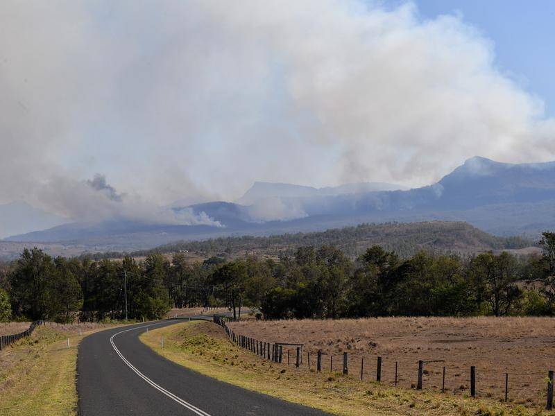 More than 158,000 hectares have been burnt and 16 homes lost in the Queensland bushfires.