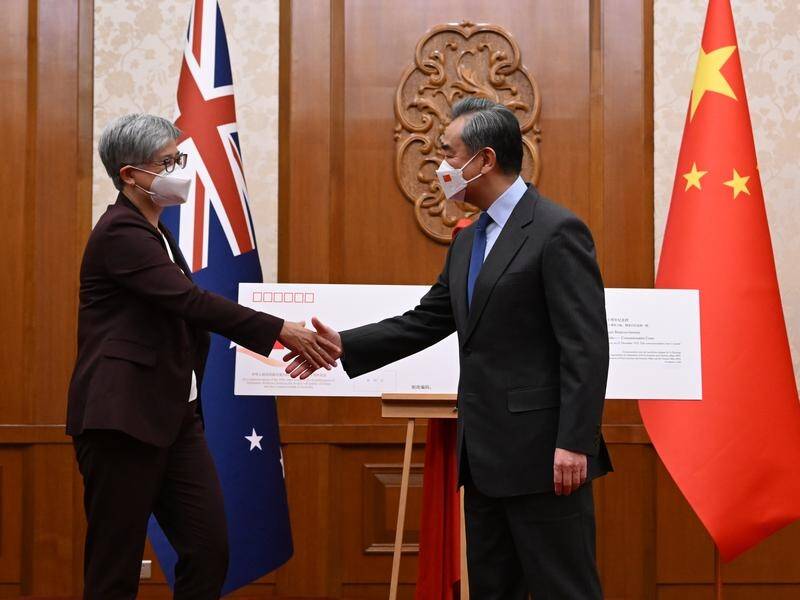 Talks between Penny Wong and Wang Yi have broken a four-year diplomatic freeze. (Lukas Coch/AAP PHOTOS)