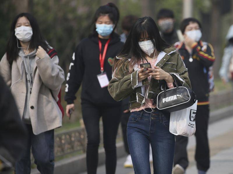 Concerns are being raised of a second wave of coronavirus cases in China as travellers return home.