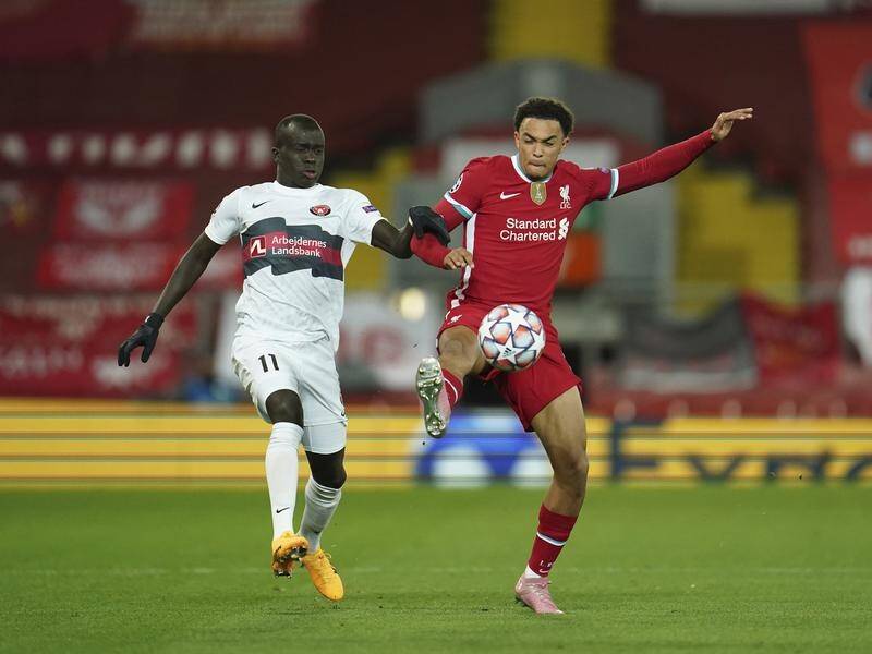Socceroo Awer Mabil (l) competes with Liverpool's Trent Alexander-Arnold in their ECL match.