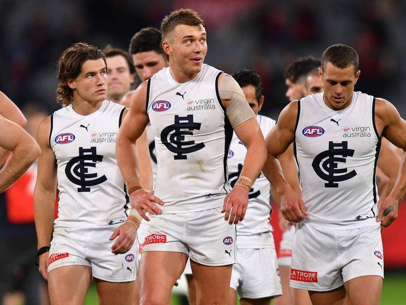 Patrick Cripps (centre) was one of Carlton's better-performed players in their loss to Melbourne.