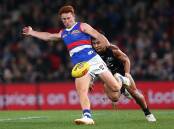 Ed Richards' long-term absence could pave the way for Caleb Poulter's debut for the Bulldogs. (Rob Prezioso/AAP PHOTOS)