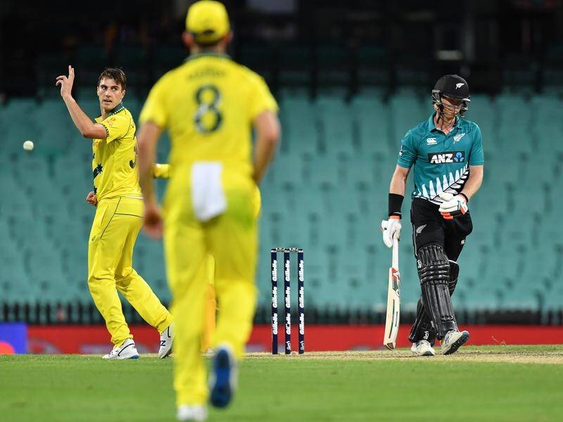 Pat Cummins celebrates Jimmy Neesham's wicket in the ODI played behind closed doors against NZ.