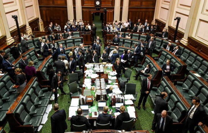 The Age, News, 20/10/2017, Photo by Justin McManus. State Parliament in an all night sitting debating the euthanasia bill. MP's cross the floor on a division.