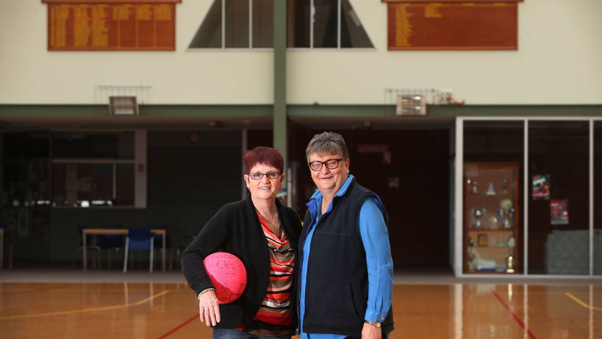South-west netball stalwarts Val Bertrand (left) and Pam Davis standing in the stadium named in Bertrand’s honour.