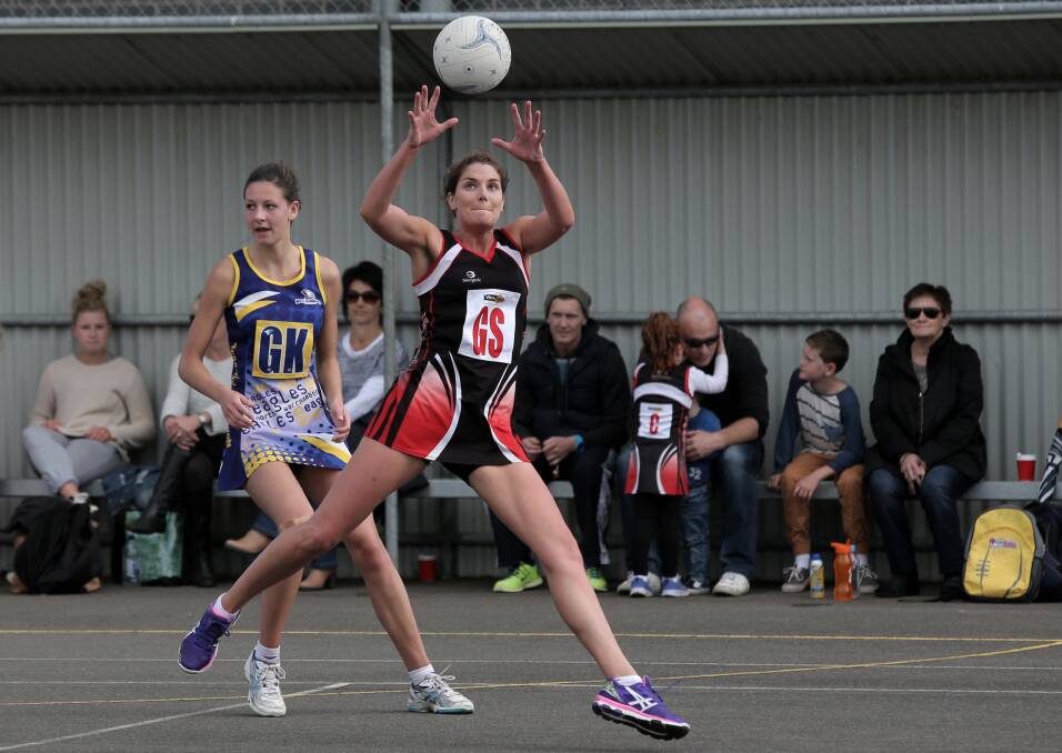 Koroit goal shooter Carley Thomas leads her Eagles opponent Rachael Ryan to the ball.  Picture: ROB GUNSTONE