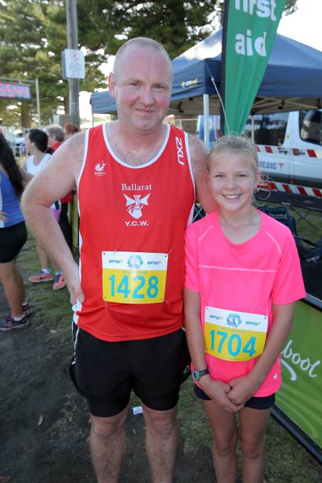 six-kilometre walk men’s winner Andrew Blood and his young female counterpart Jemma Peart, 12. 