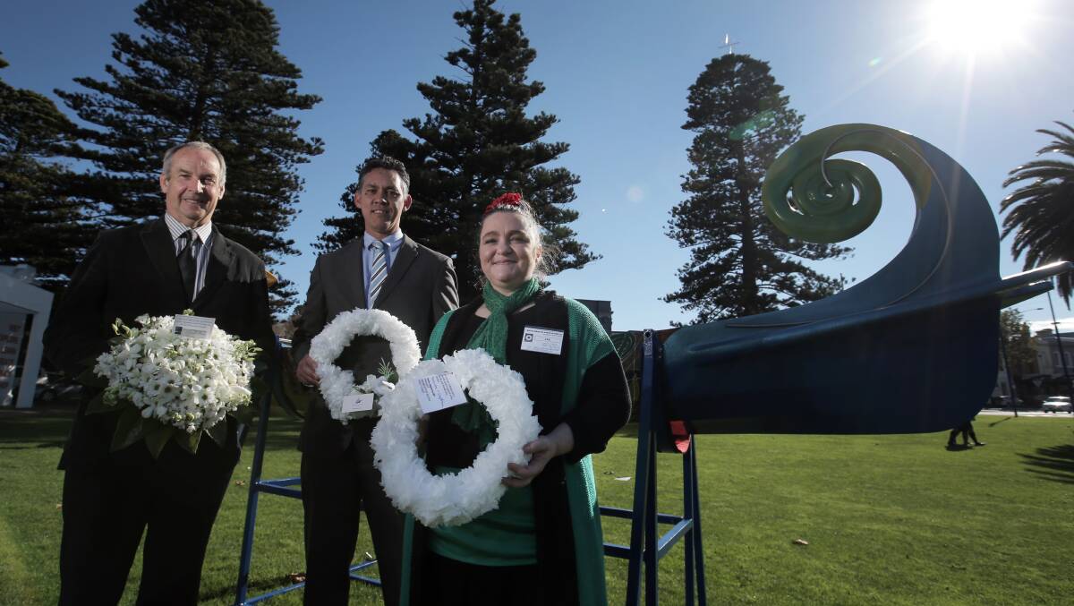 Moyne Shire mayor James Purcell and Warrnambool City Council mayor Michael Neoh and Warrnambool White Wreath Day organiser Lyn Mast in front of the Sky Canoe by local artist David Higgins that was displayed as part of White Wreath Day. 