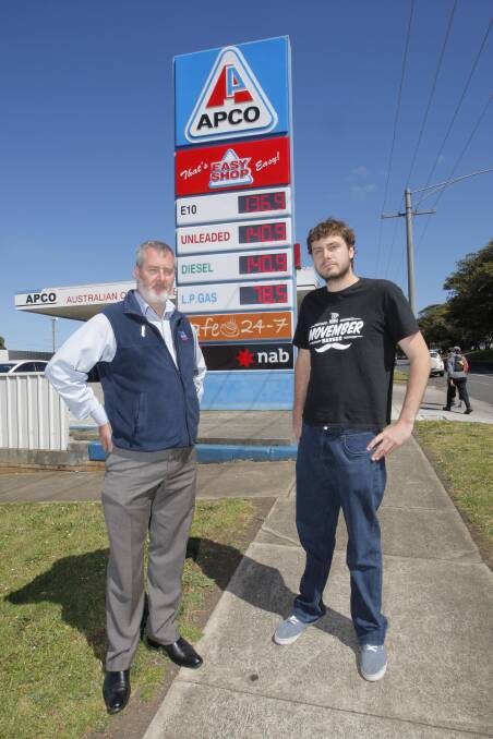 South West Coast ALP candidate Roy Reekie talks petrol costs with Deakin University Geelong student Ben O’Sullivan.    
Picture: ANGELA MILNE