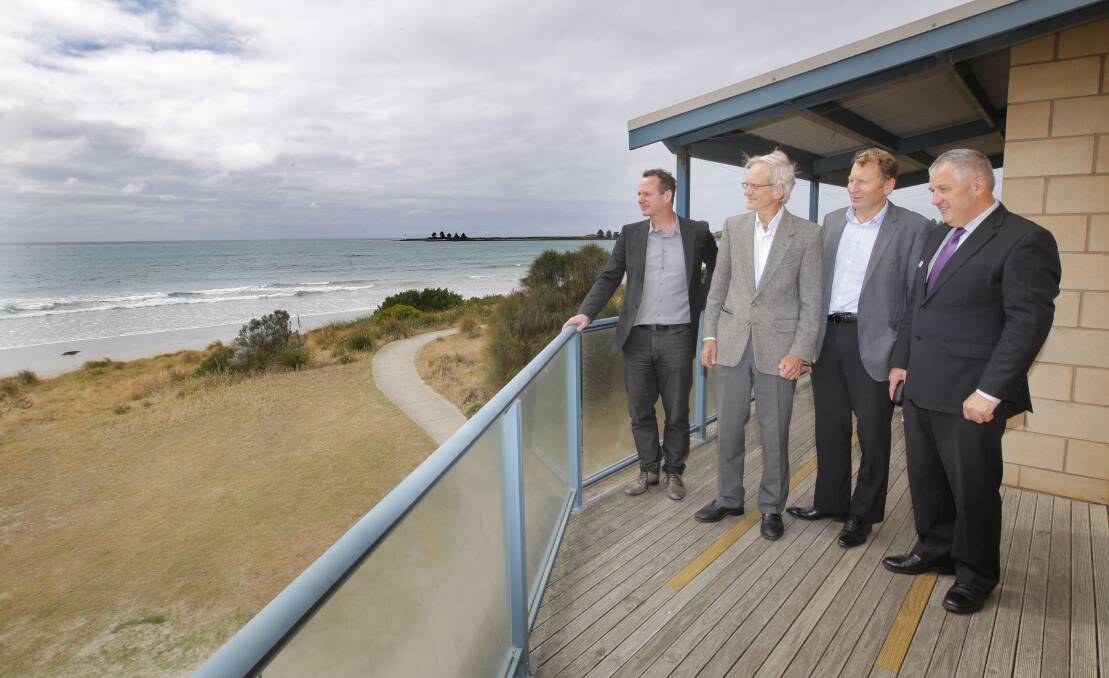 At yesterday’s poster project launch were (from left) Motif Architects’ Roger Schmidt, Port Fairy Coastal Group chairman Nick Abbott, Department of Environment and Primary Industries’ Ross Martin and Moyne Shire mayor Colin Ryan.  Picture: ANGELA MILNE