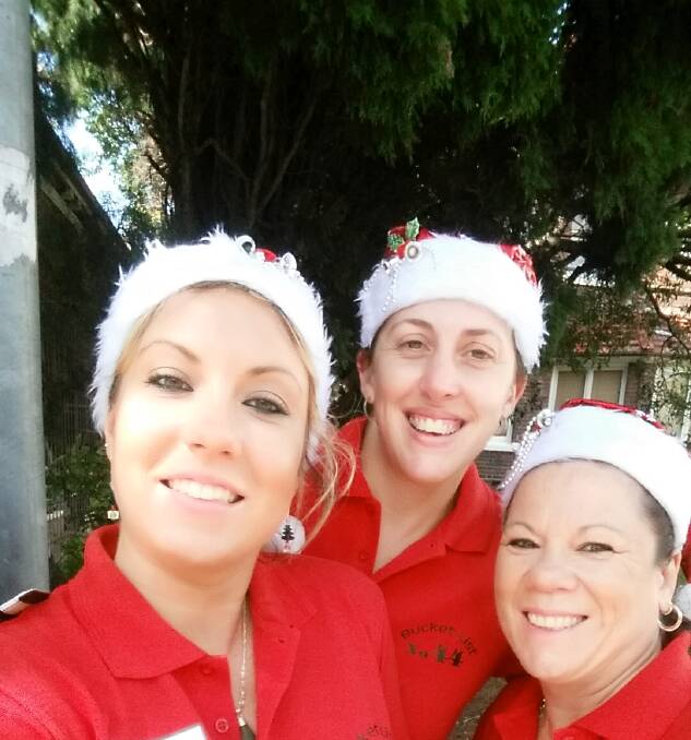 BEST EVER: Stacey Ballantine and Michelle Fryer, sister and mother of the late Kaileigh Fryer, with Tracey Spence (centre) at the Exodus Foundation on Christmas Day.