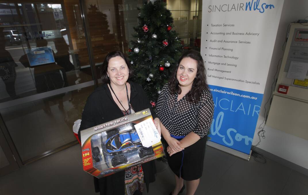 Felicity Melican (left), principal at Sinclair Wilson, and Lifeline South West manager community engagement Chloe Brian hope the joint appeal will brighten the lives of children and families in need this Christmas.     