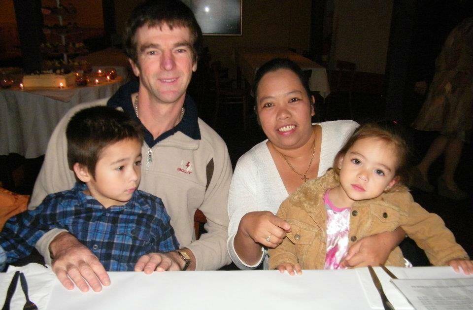 Missing Warrnambool man Michael Burn pictured with his wife and two children.