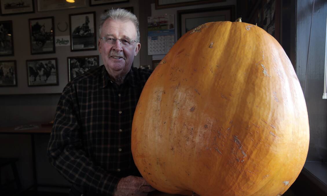 Woolsthorpe Hotel publican John Bowd with the giant pumpkin.
