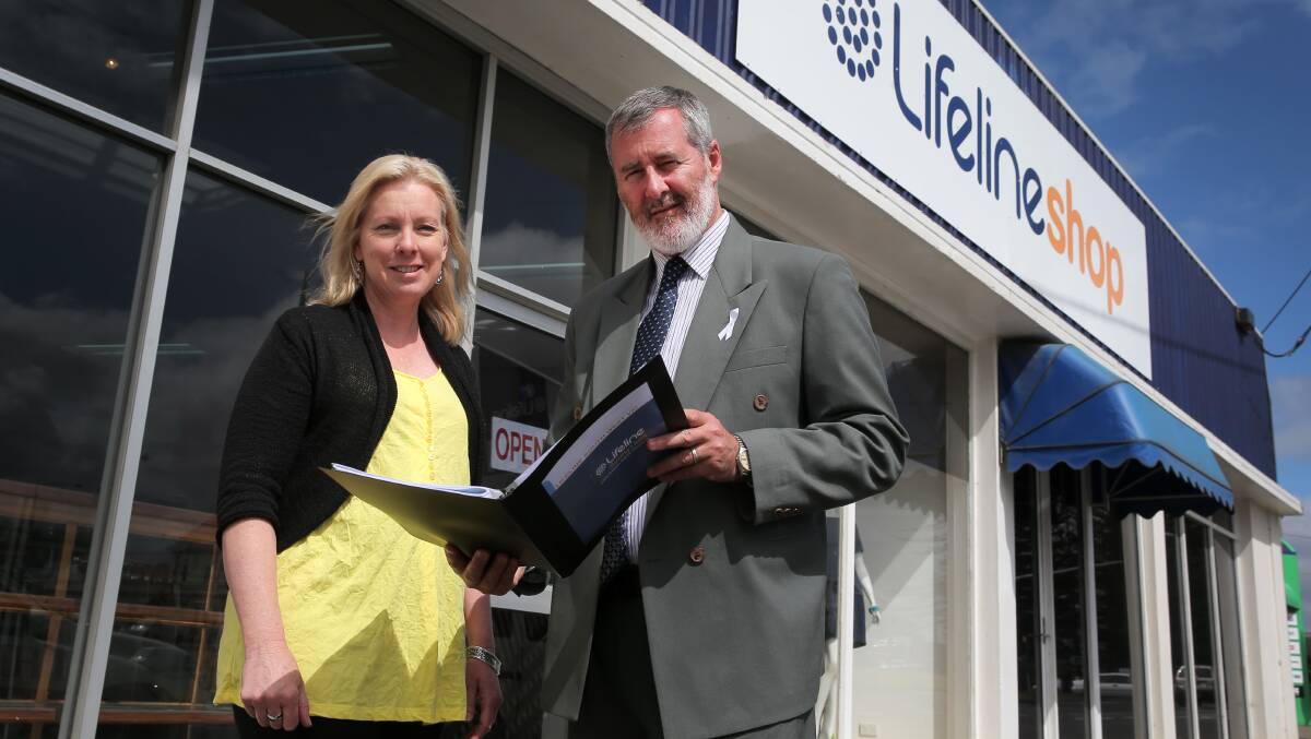 Lifeline south-west Victoria CEO Meredith Ericson receives a pledge of financial support from Labor candidate for South West Coast Roy Reekie