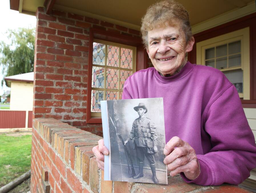 Cobden’s Nellie Dunstan, 80, holds a photo of her uncle Clem Loader, whose final resting place may be in a mass grave at Krithia, Gallipoli.