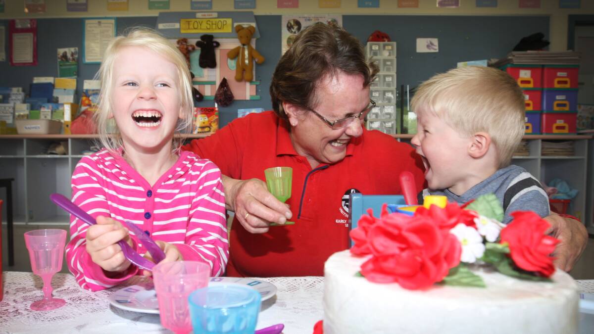 Warrnambool’s Zoe Davis, 4, and  her brother Finn, 2, enjoy a make-believe tea party at Warrnambool Uniting Church childcare centre with director Liz Sparrow. 