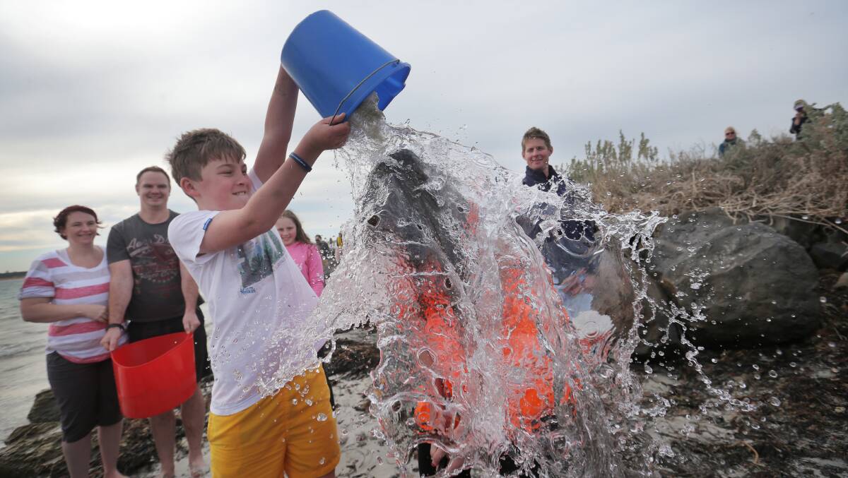 About 750 people took to Warrnambool's foreshore on Sunday for the ice bucket challenge, which raises money for motor neurone disease.