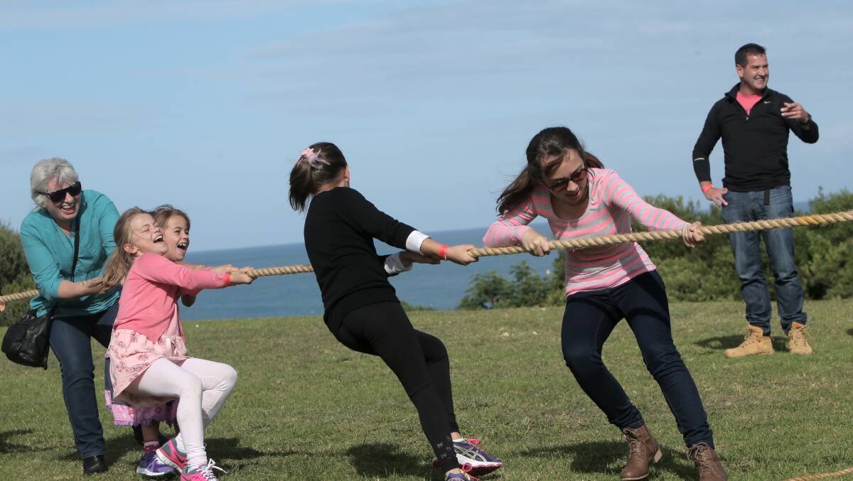 Judith Fisk (left), with  Emily, 9, Isabelle, 7, Hayley Fisk, 10,  from Koroit, and Amy Smedley, 12, from Altona try their hand at tug-o-war. Picture: AARON SAWALL