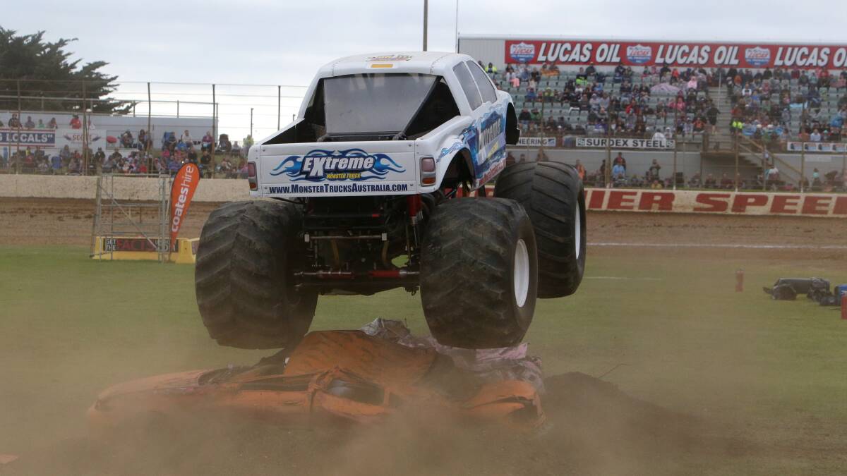 Monster trucks perform at Premier Speedway on Saturday night. Pictures: AARON SAWALL