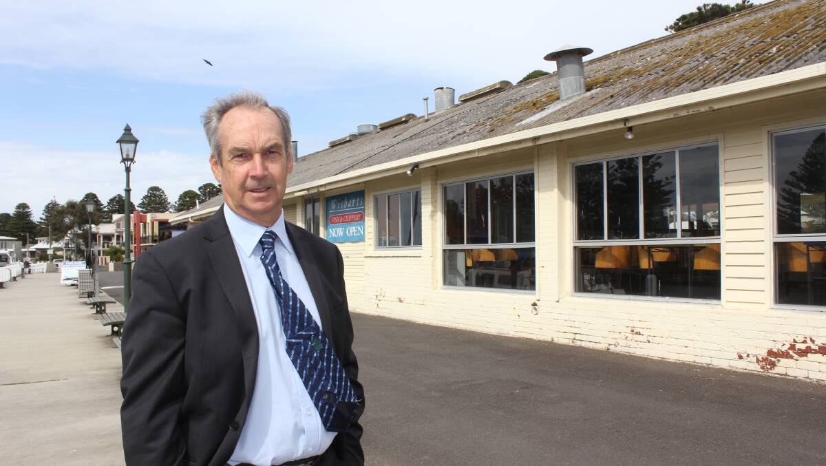 Moyne Shire Mayor James Purcell in front of the building at the centre of resident's concerns. Picture: MOYNE GAZETTE