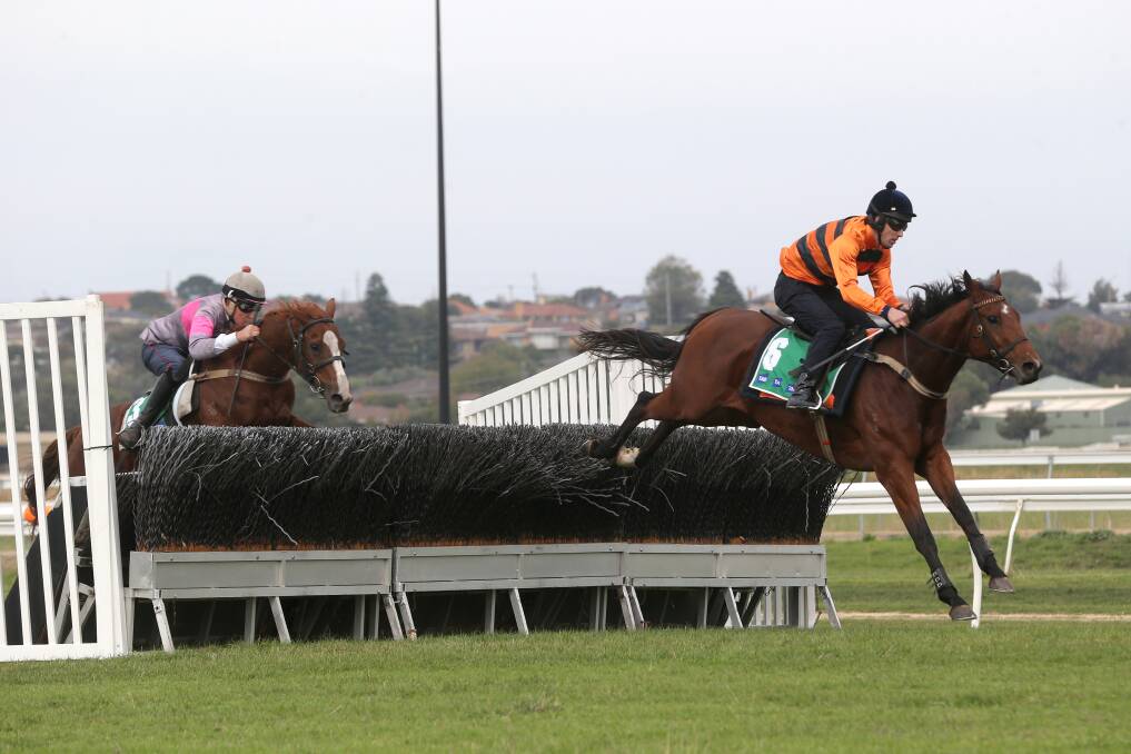 Steven Pateman guides Mannertone over a jump in a steeplechase trial. 150417DW06 Picture: DAMIAN WHITE