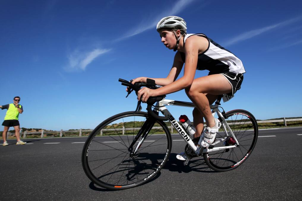 Young cyclist Ashleigh Hocking shows her versatility, contesting a triathlon in March.130326RG46 Picture: ROB GUNSTONE