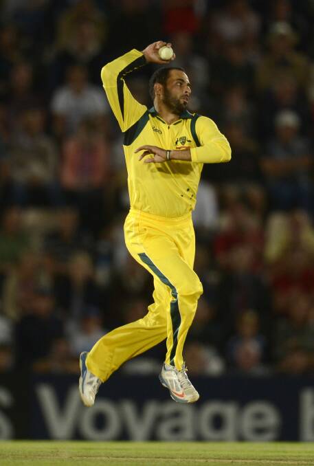 Leg-spinner Fawad Ahmed winds up for Australia in a T20 against England in Southampton. Picture: REUTERS