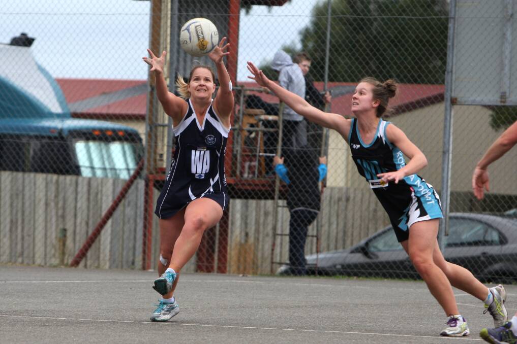 Allansford wing attack Heidi Manson (left) and Kolora-Noorat wing defence Laura Kemp are still playing for a shot at post-season action.  140614LP07 Picture: LEANNE PICKETT