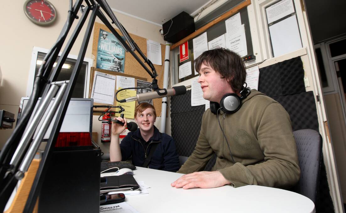 Jake Dotson, 15, (left) and Nick Trewartha, 22, are among the young presenters behind youth-run radio shows from the Warrnambool 3WAY FM studios. 140910AS30 Picture: AARON SAWALL