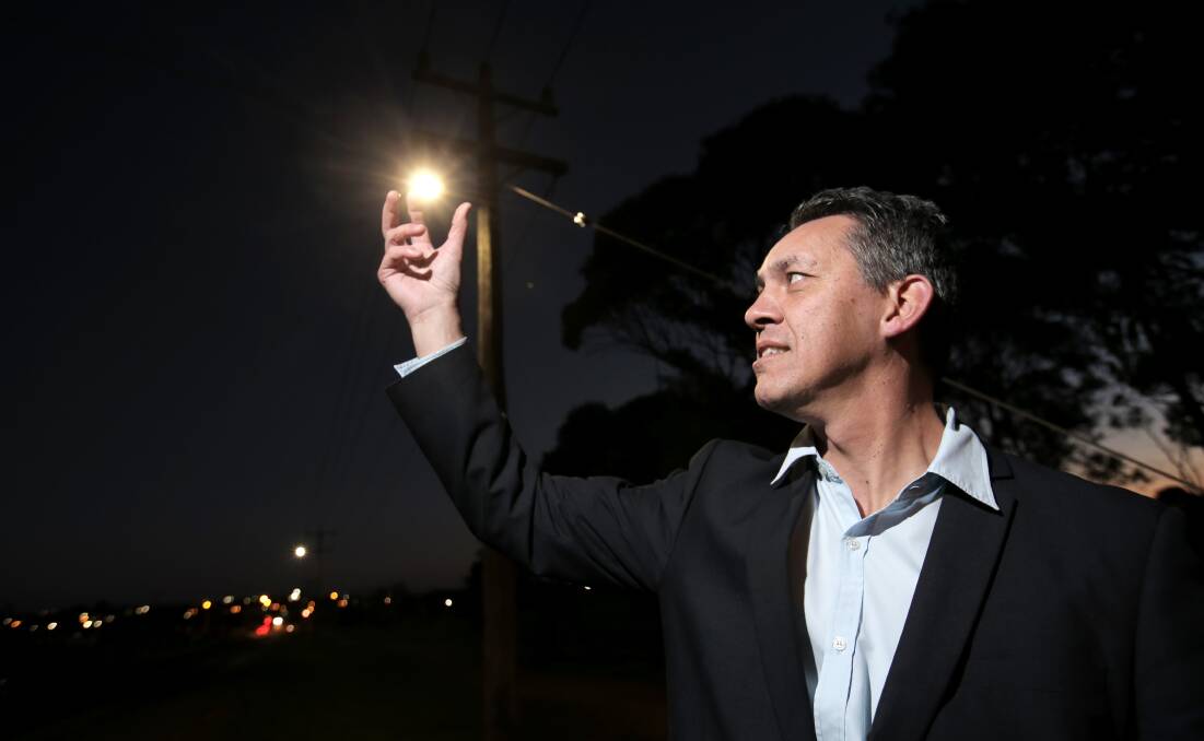 Warrnambool mayor Michael Neoh with one of the new energy-efficient LED street lights. 140703RG33 Picture: ROB GUNSTONE