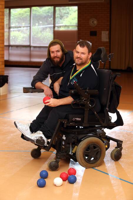 A national boccia titles bronze medal is fuelling higher ambitions for Danny Byrne, who is coached by his brother Keegan Byrne (left). 