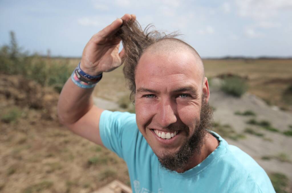 Ben Noonan, of Warrnambool, raised $1600 for Shave For A Cure after having half his hair and half his beard shaved. 