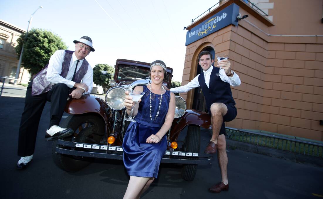 Looking forward to Friday night’s Gatsby-themed fund-raiser are Doug Byron, with his 1929 Oakland, and martini-toting siblings Sarah and Alister Porter. 