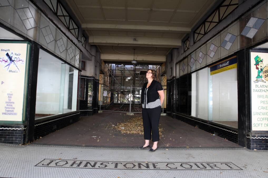 Terang Progress Association secretary Sandra Noonan looks over the historic Johnstone Court shopping arcade, which is now for sale. 
150402LP11 Picture: LEANNE PICKETT