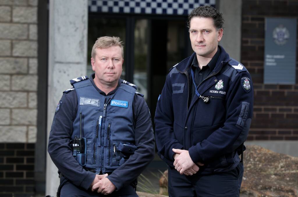 Leading Senior Constable Mick Little (left) and Sergeant Callum McKinnon have been honoured for distinguished service. Picture: ROB GUNSTONE