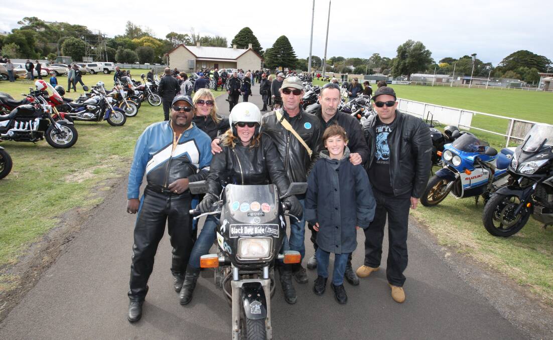 Riders on the Black Dog 1-Dayer to raise awareness of depression called in at the Koroit Swap Meet yesterday on their way to Port Fairy. Kevin Council (left), Corinne Smith, ride facilitator Heather Muskee (on bike), Dave Hancock, Greg Leathbridge, Allister Naismith (front) and Tim Bamfield enjoyed the break.