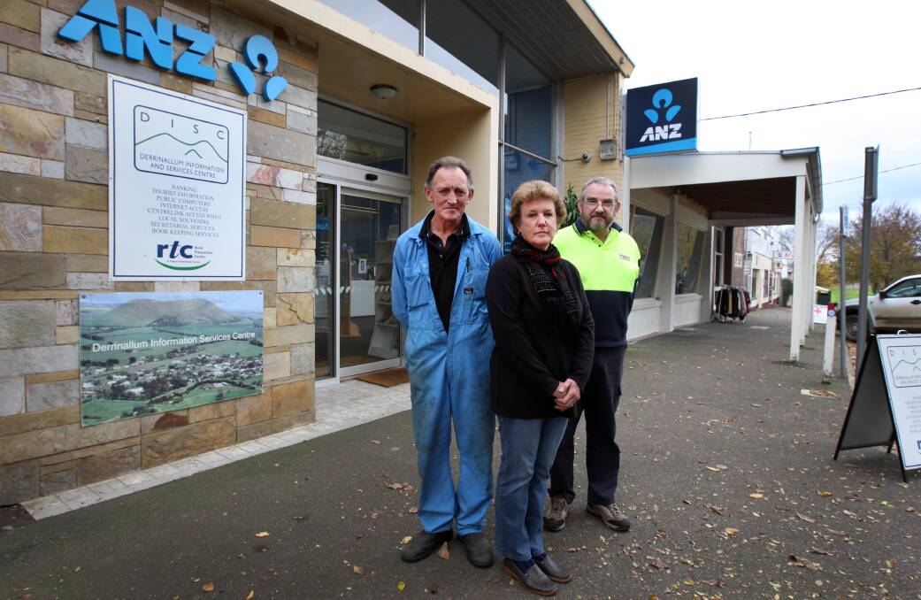 Derrinallum Progress Association president Geoff Henderson (left), secretary Lesley Brown and treasurer Larry Howard are worried about the bank closure’s repercussions. 140619LP24 Picture: LEANNE PICKETT