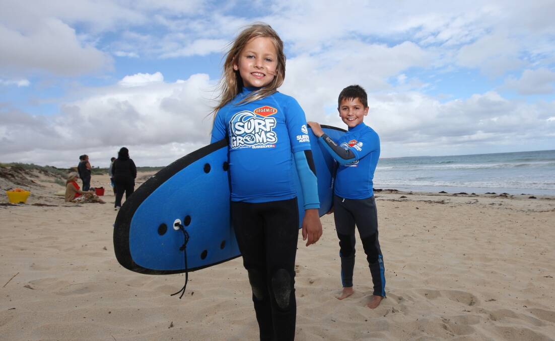 Warrnambool siblings Asha, 7, and Jace Nepean, 10, will get to meet surfing world champions Stephanie Gilmore and Kelly Slater after a winning a photography award. 