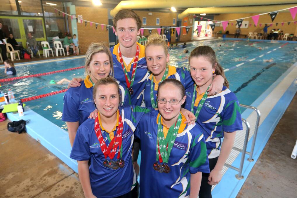 Medallists Lainey Miller, 15 (back left), Jamin Baulch, 17, Meg Flaherty, 16, Holly Windahl, 13, Caitlyn MacKay, 18 (front left), and Ashleigh Pettigrew, 24, underpinned a strong Warrnambool performance. 140818AS05 Picture: AARON SAWALL