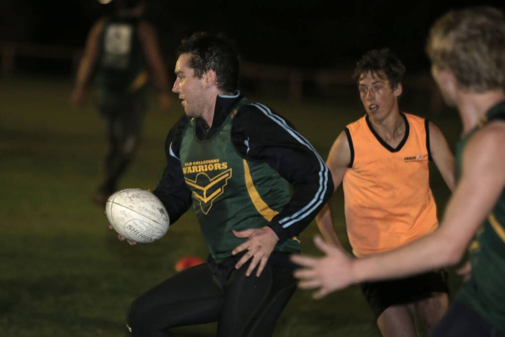 Josh Stapleton proves hard to catch at Old Collegians training, turning two pursuers. Picture: ROB GUNSTONE