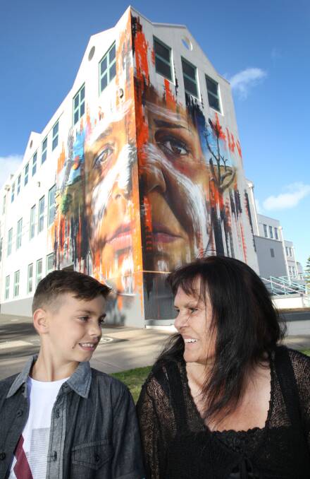 Rylan Miller, 8, and Bernice Clarke, whose faces are depicted in the Ngatanwarr mural, at Friday’s official launch.   150320AM36    Picture: ANGELA MILNE