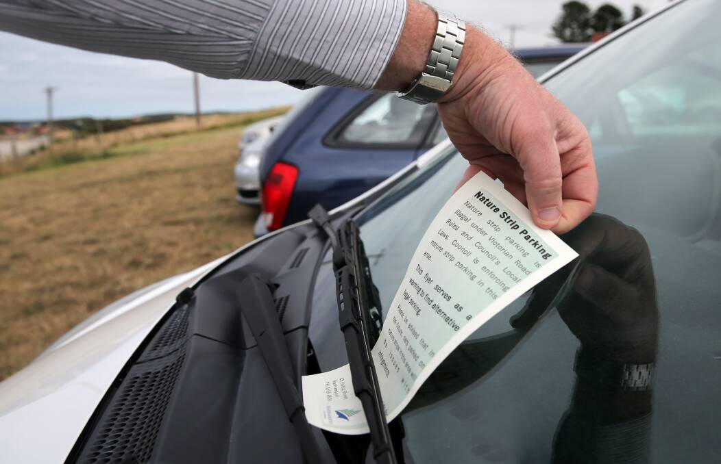 WCC officers have begun placing flyers on the windscreens of cars parked on nature strips near Warrnambool hospital. 141209RG21 Picture: ROB GUNSTONE
